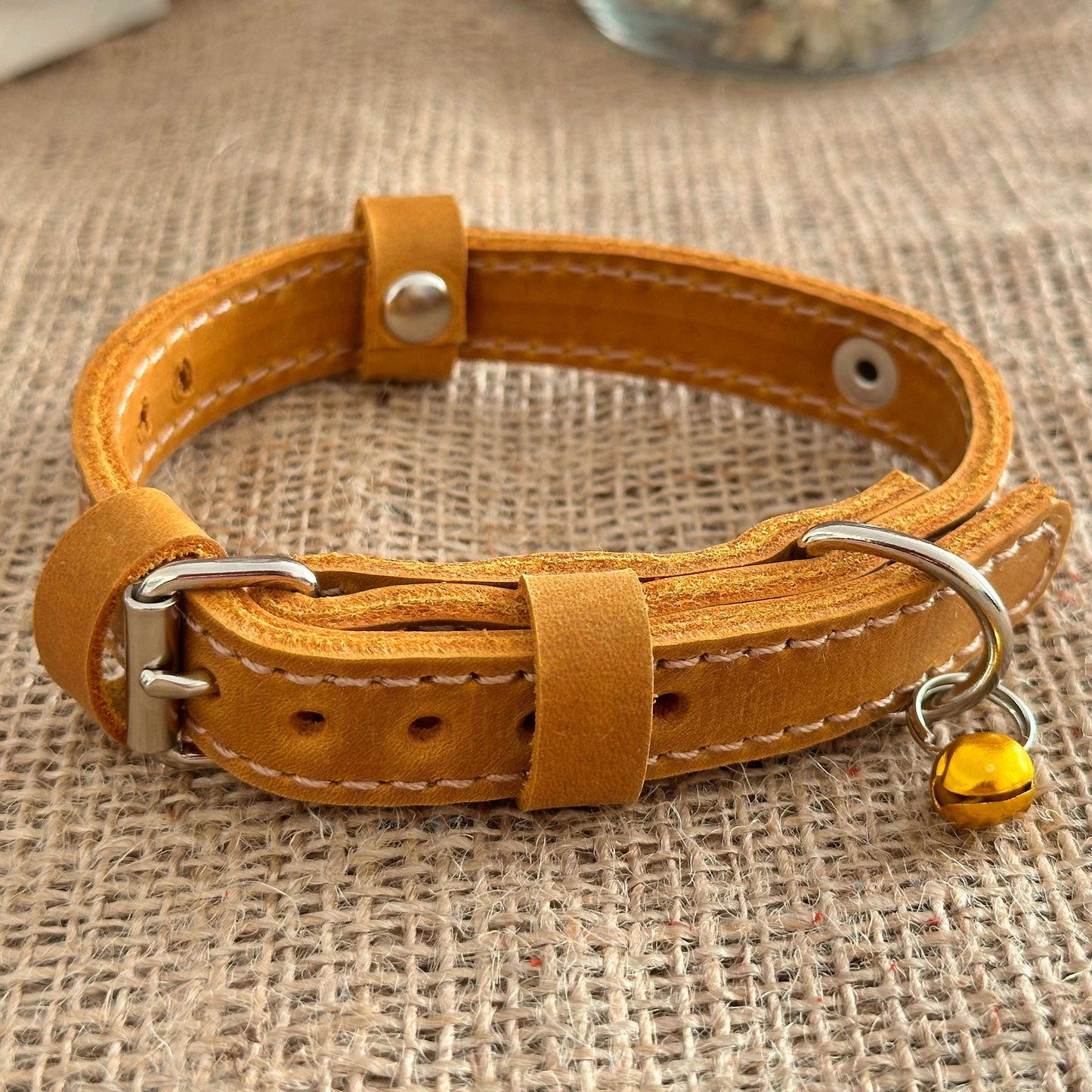Engraved leather kitten collar with stylish design, available in multiple colors.