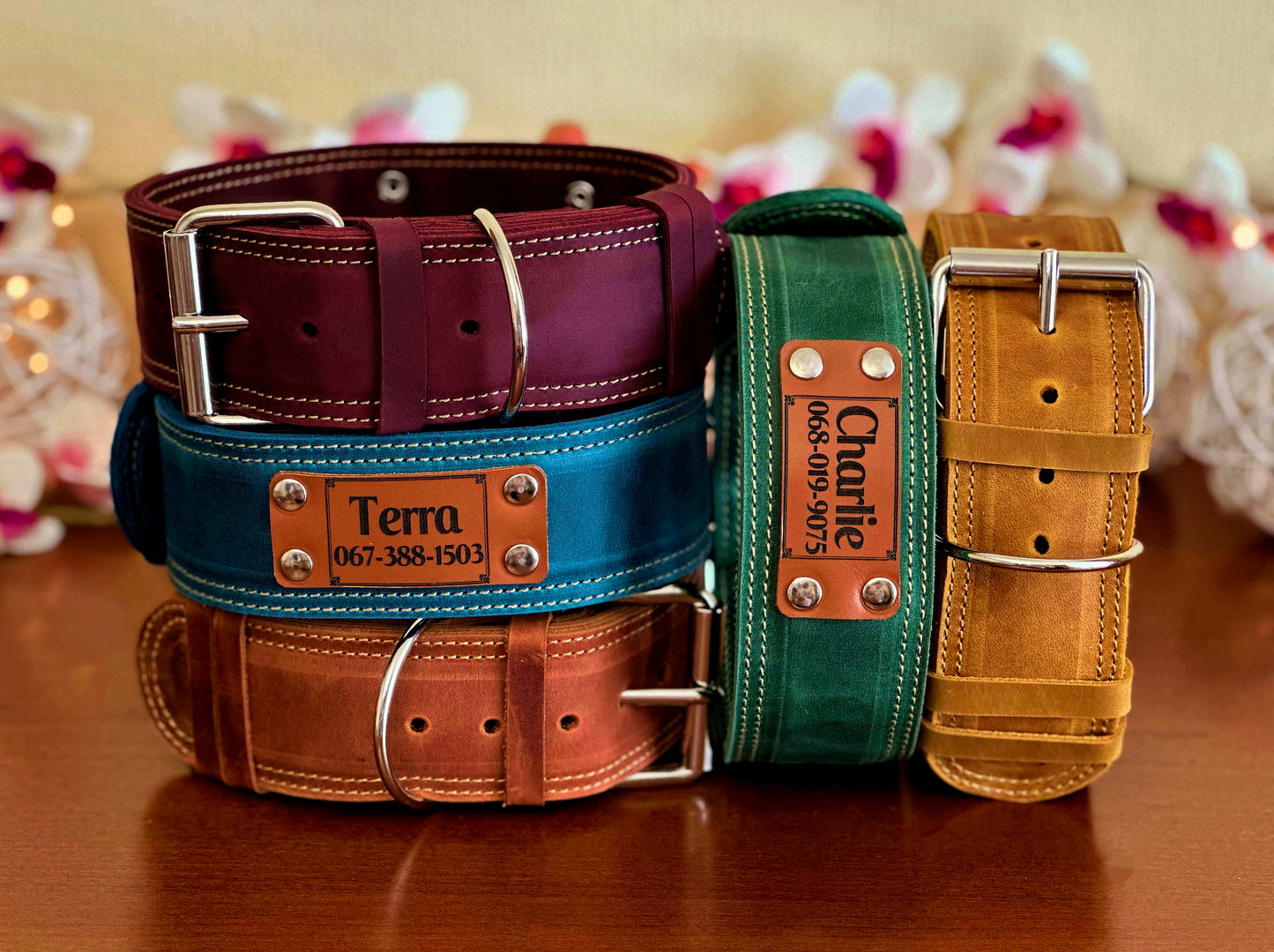 Custom 2-inch sturdy leather dog collar, made for tough dogs with reinforced stitching and a personalized nameplate.