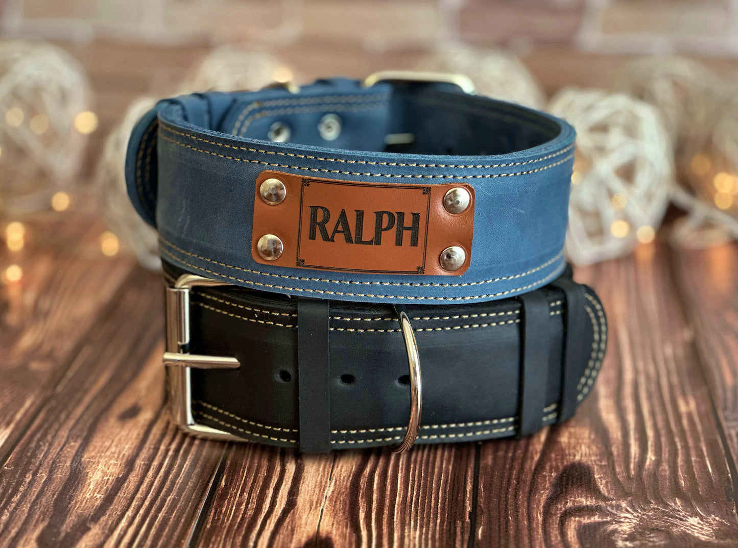 Heavy-duty 2-inch wide leather dog collar with personalized name engraving, ideal for active and strong dogs.