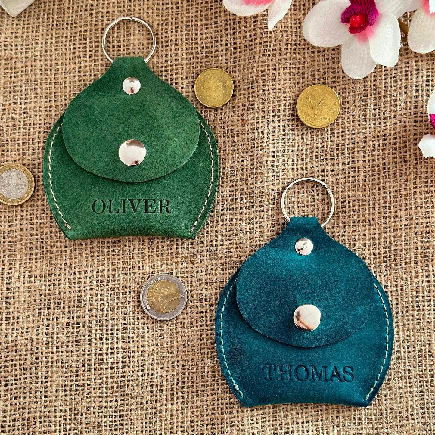 Leather coin pouch open with coins inside, showcasing practicality and organization