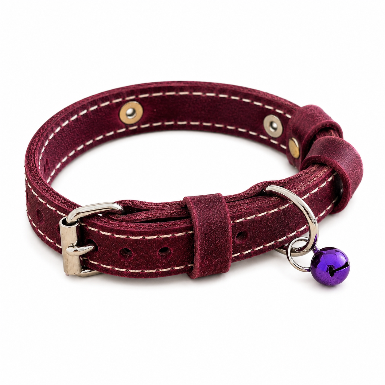 Maroon leather dog collar with a purple bell on a white background