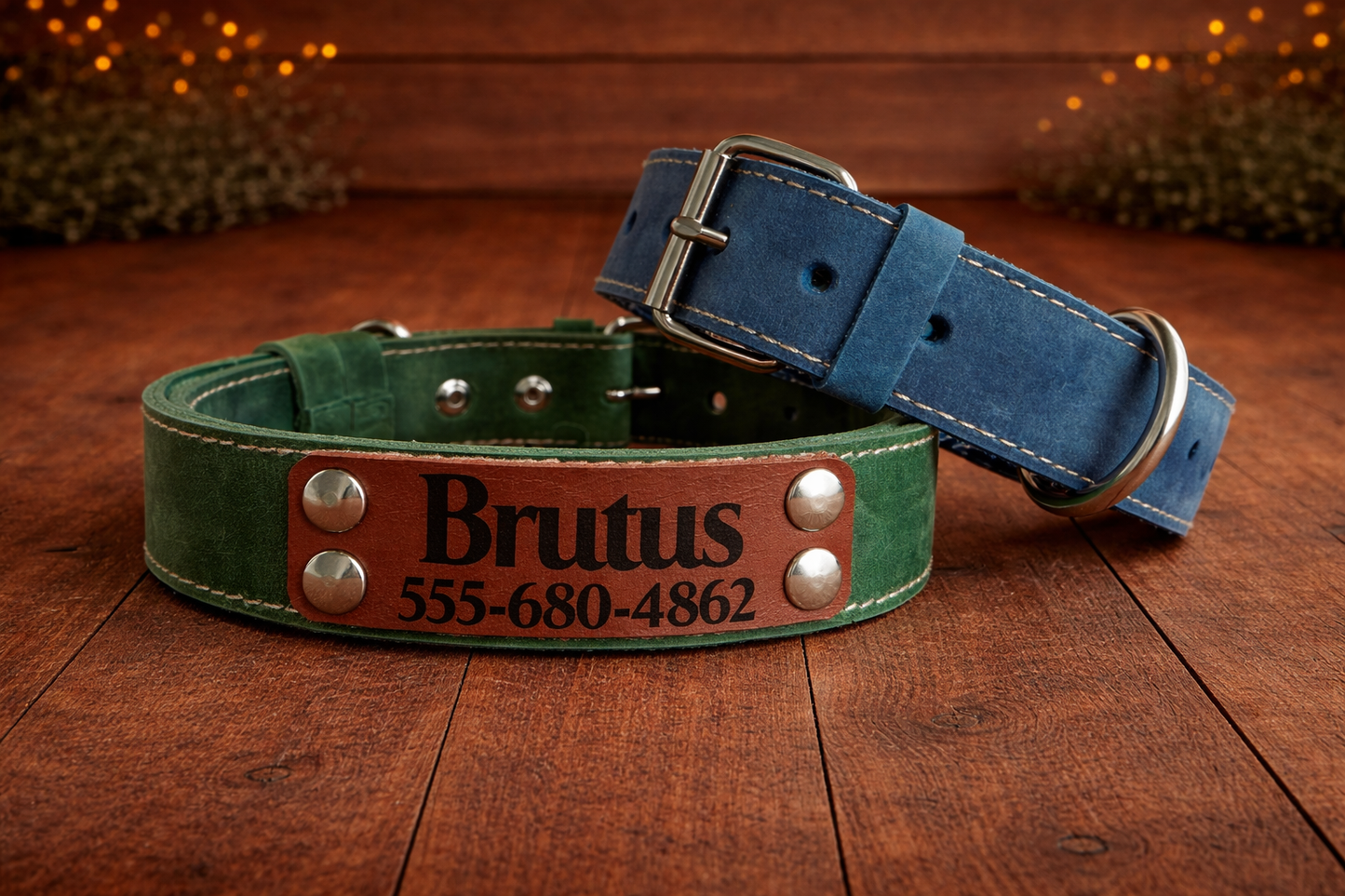 Two leather dog collars, one green and one blue, on a wooden surface with 'Brutus' and phone number engraved.