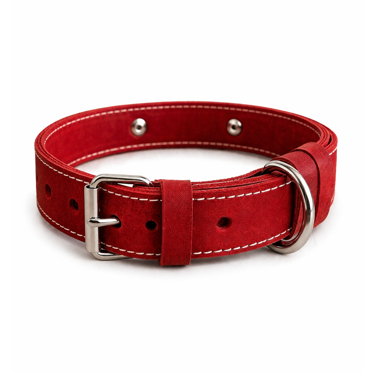 Red dog collar with silver buckle and hardware on a white background
