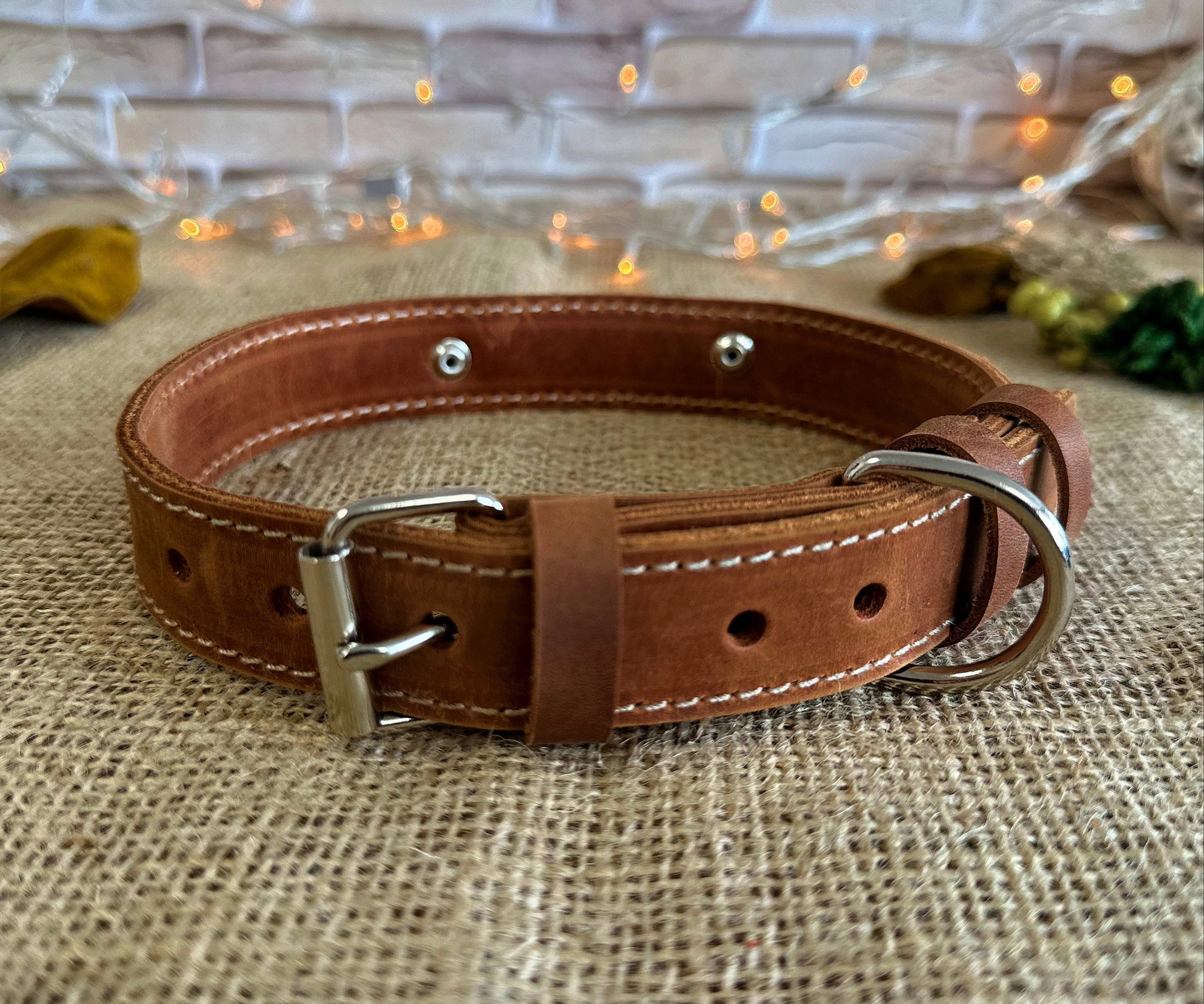 Sleek brown leather collar with durable buckle