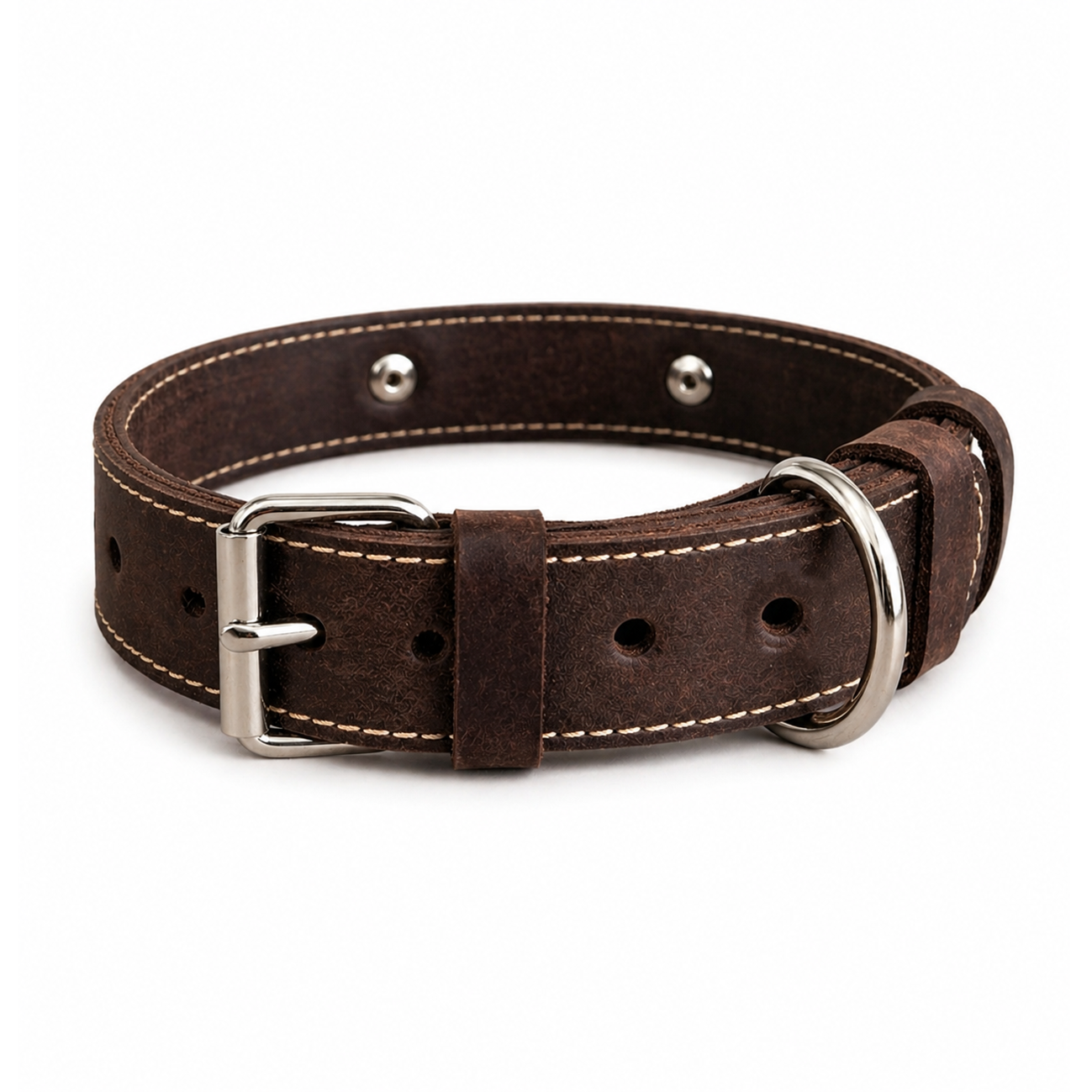 Brown leather dog collar with silver buckle on a white background