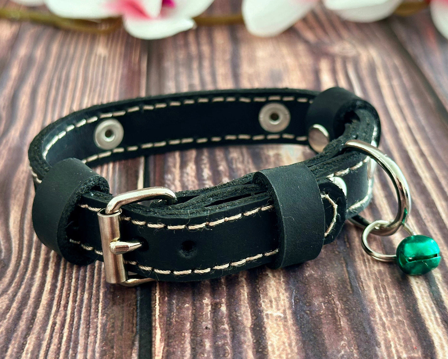 Personalized leather kitten collar with name and phone number engraving for safety.