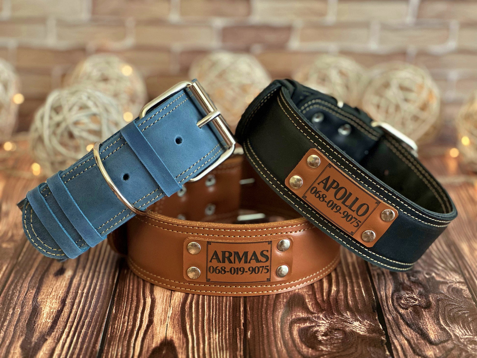 Heavy-duty wide 2-inch custom leather dog collar, built for comfort and strength with an engraved nameplate.