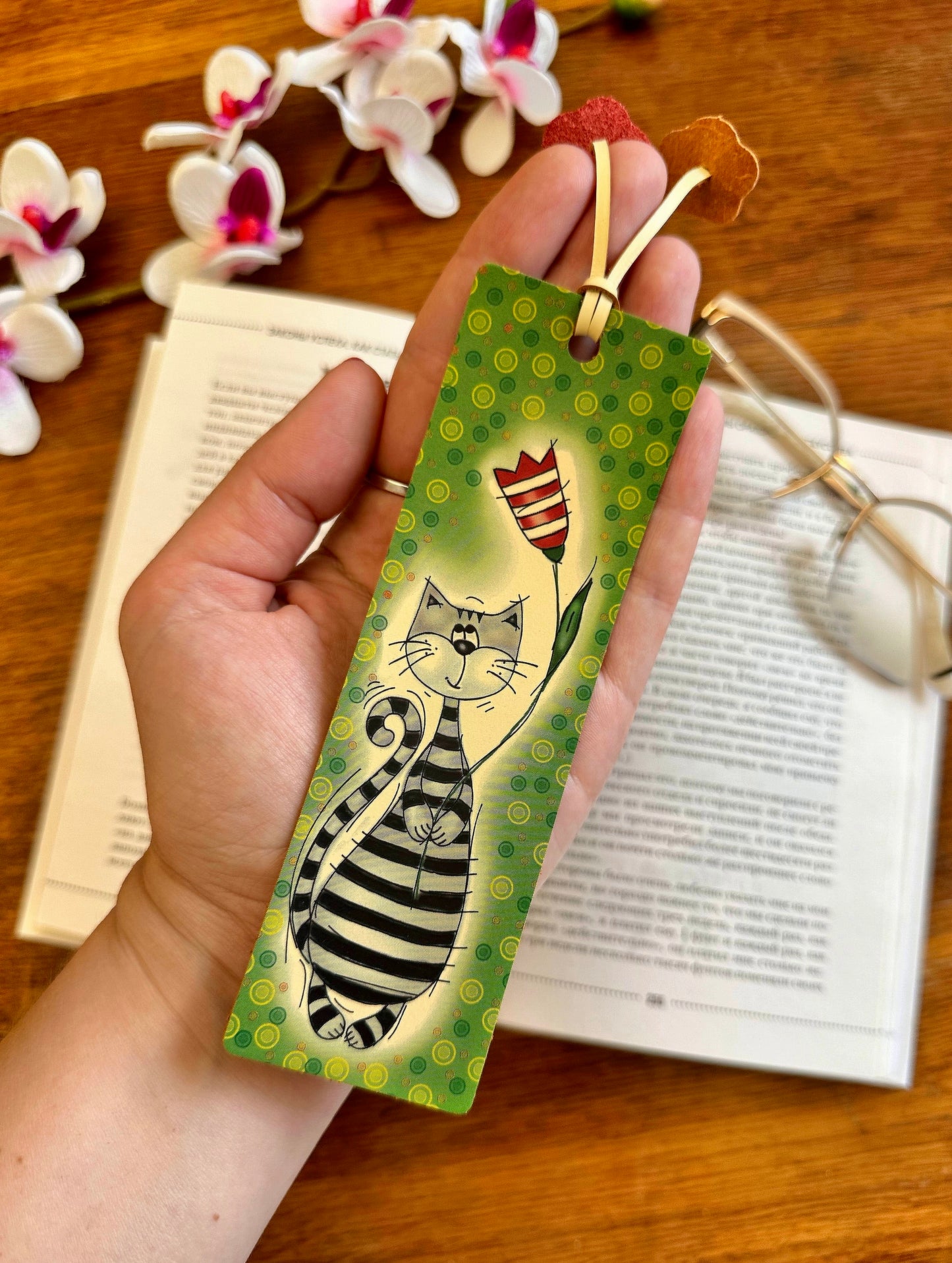 Leather bookmark with personalized name engraving, ideal for book lovers who appreciate custom accessories