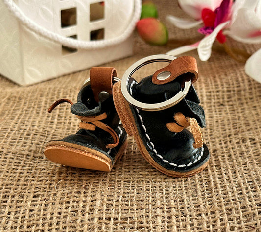 Engraved leather boot keychain with a name or message, perfect for personalized gifts