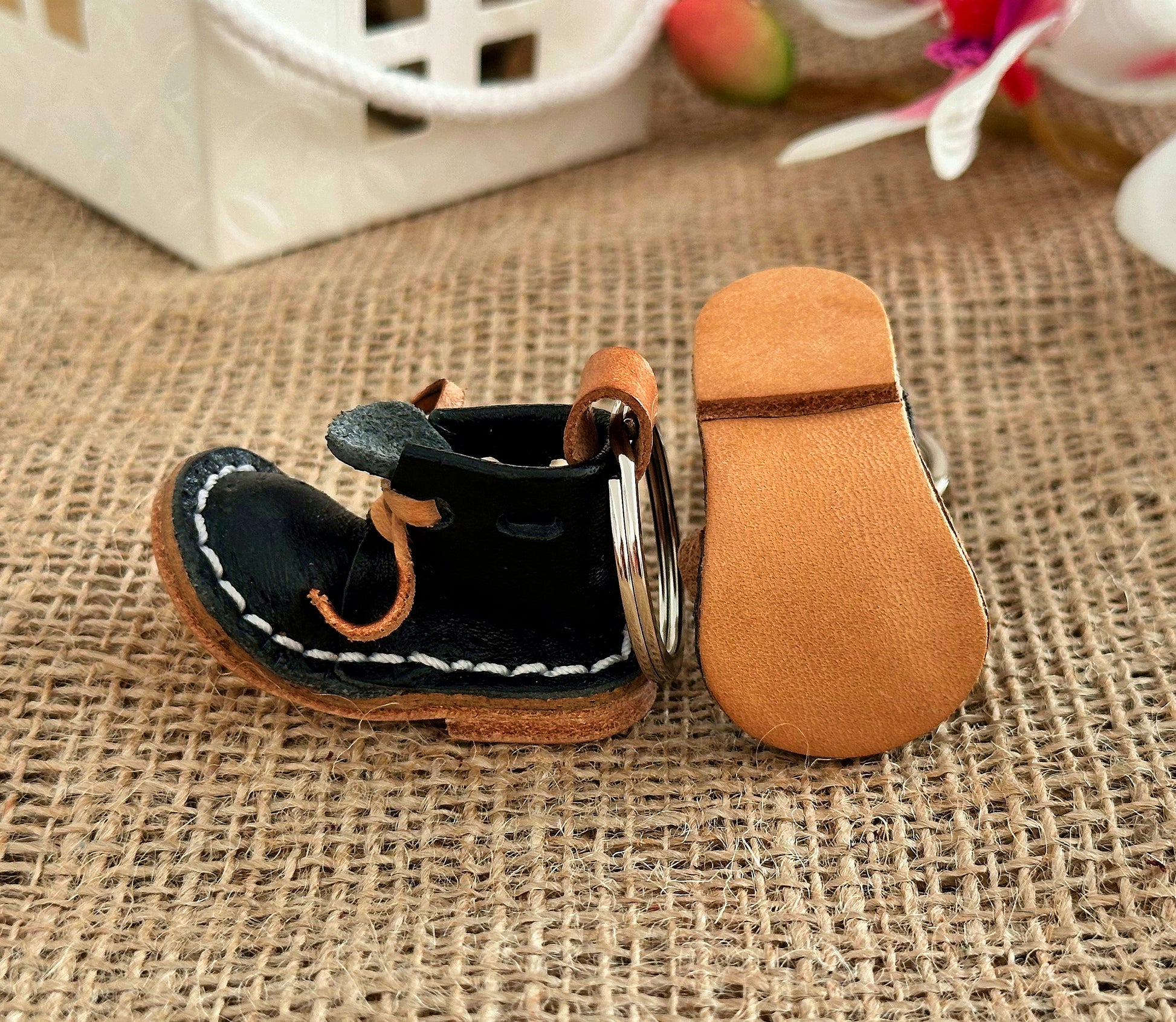 Leather boot keychain designed for men, combining ruggedness with style for everyday use