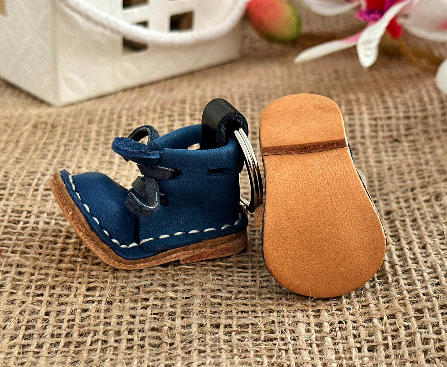 Rustic leather boot keychain with a vintage finish and durable construction