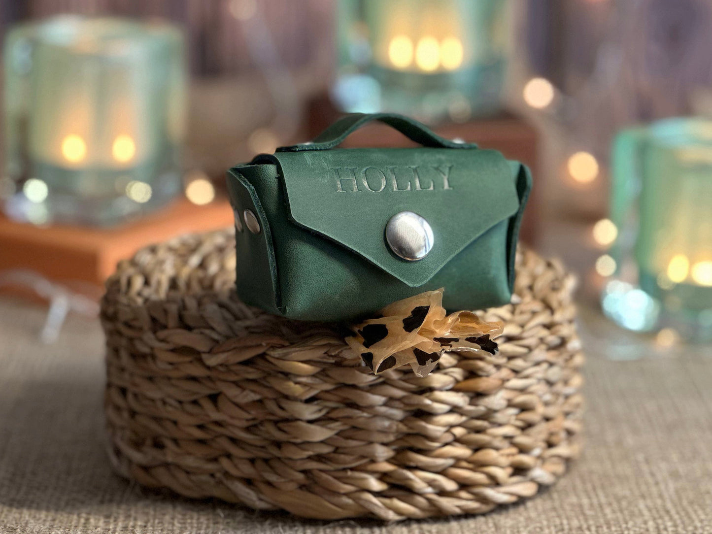Close-up of a high-quality leather dog waste bag holder showcasing craftsmanship