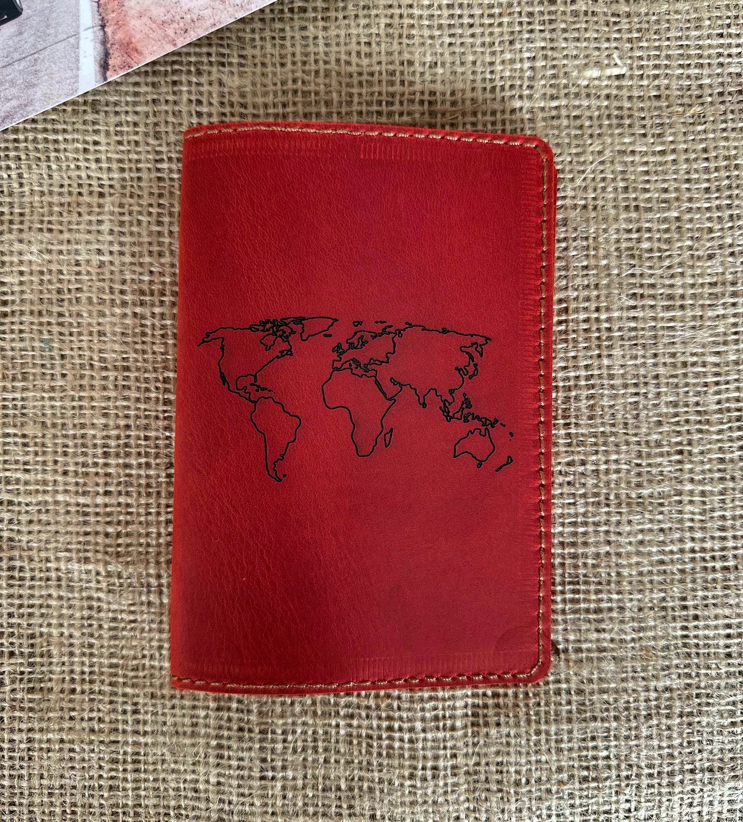 Front view of leather passport cover in brown