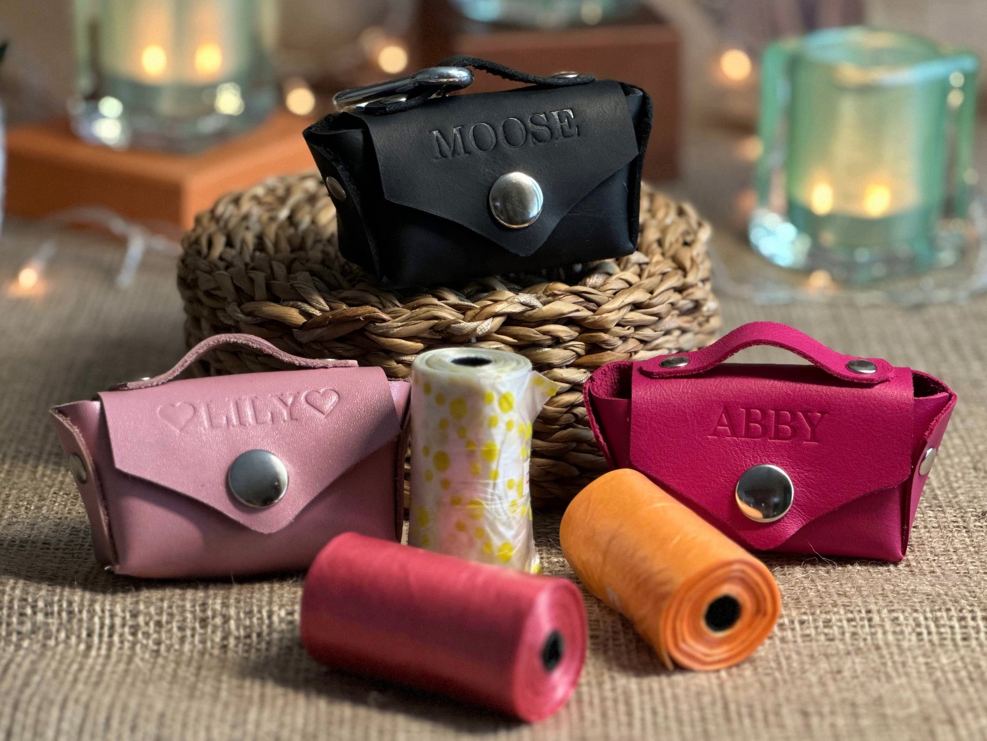 Close-up of leather poop bag holder’s carabiner, designed for easy attachment to leashes or belts