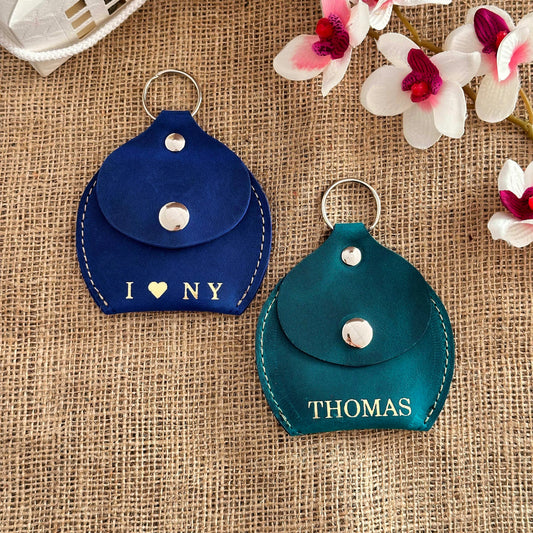 Luxury leather coin pouch featuring custom initials, offering a sophisticated look