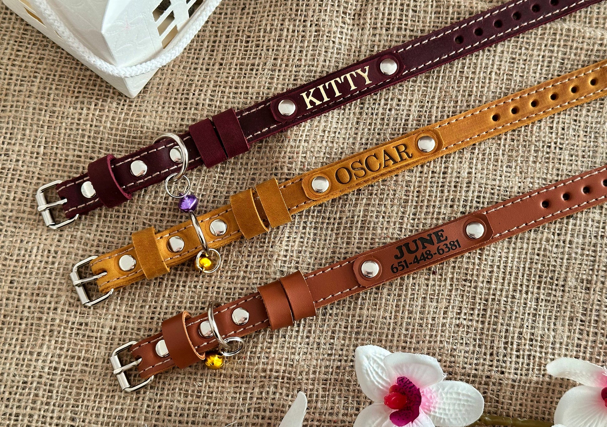 Leather cat collar with ID tag, perfect for stylish and safe pets.