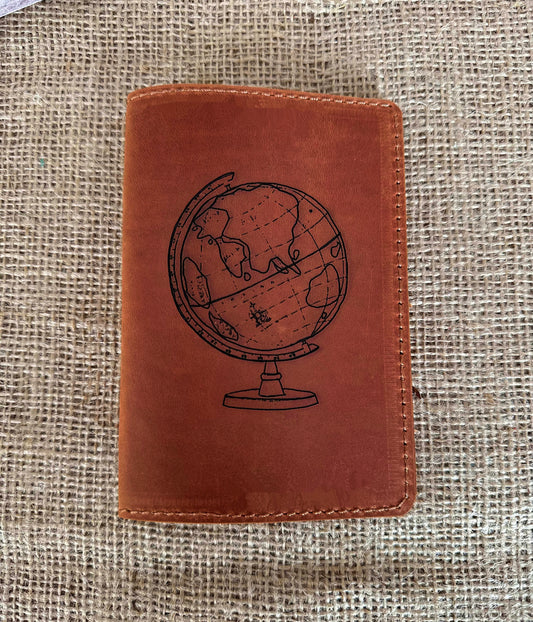 Passport cover opened with passport and travel documents inside