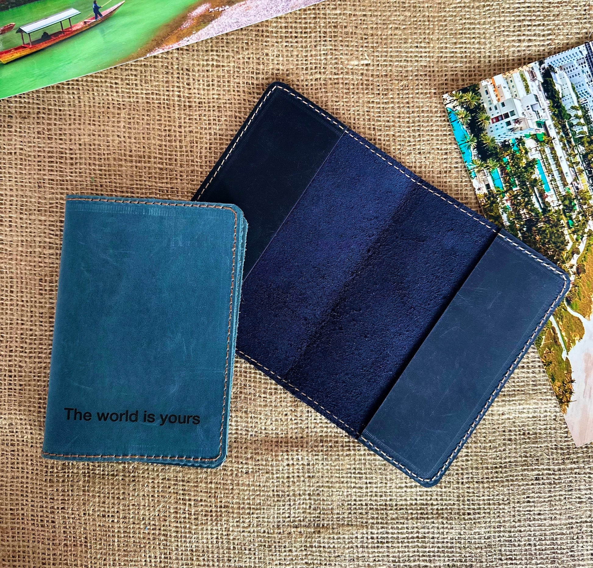 Open passport wallet showing compartments without contents