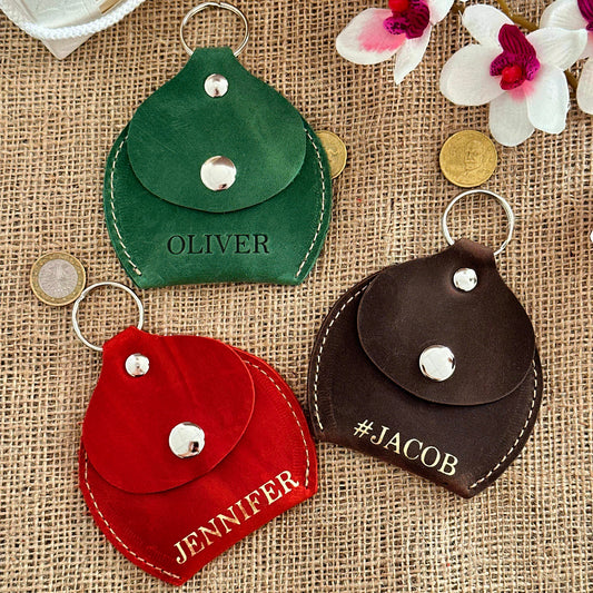 Personalized leather coin pouch in front view, showcasing smooth finish and compact design