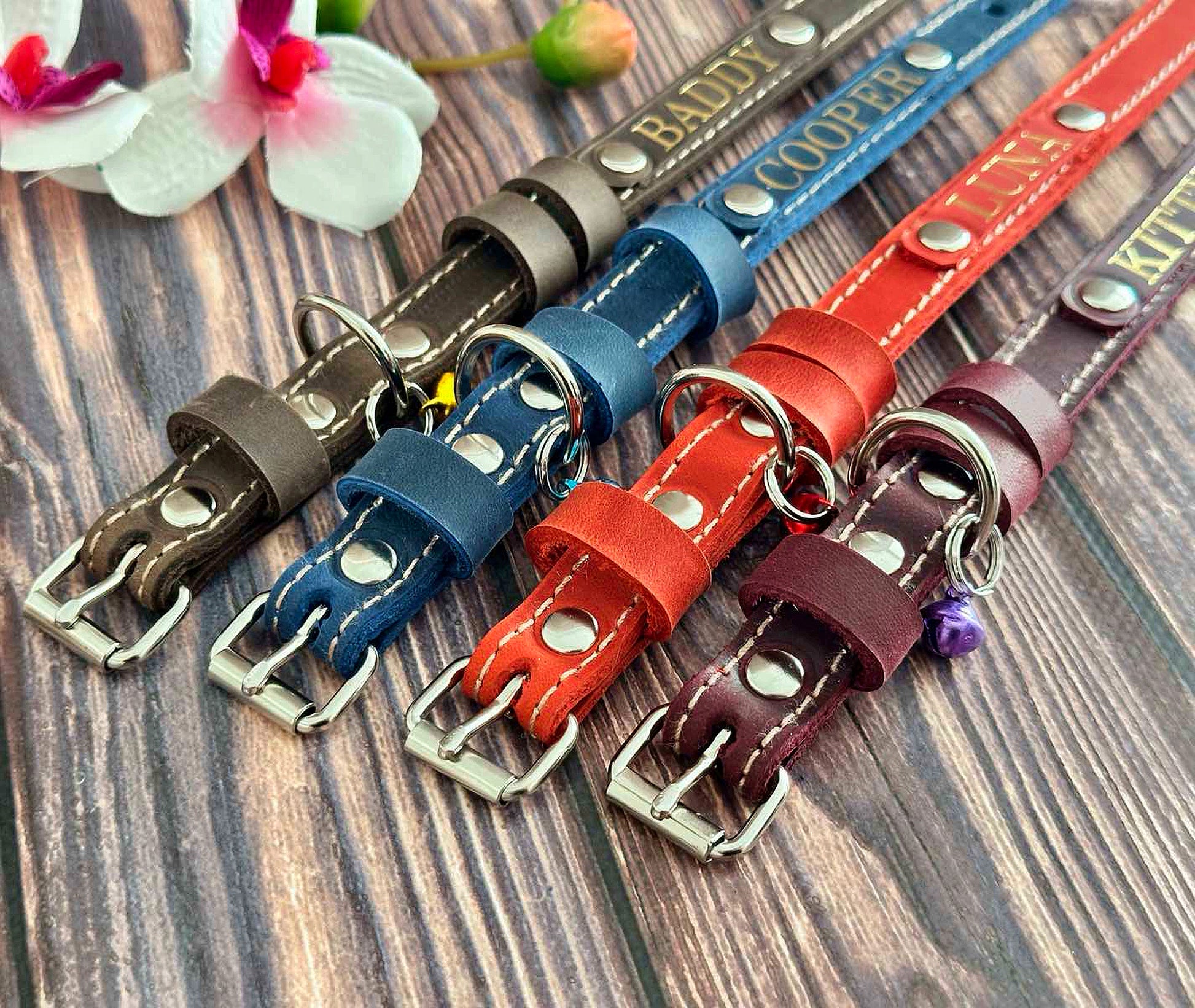 Stylish custom leather cat collar with a personalized name tag. Comfortable and durable design for everyday wear.