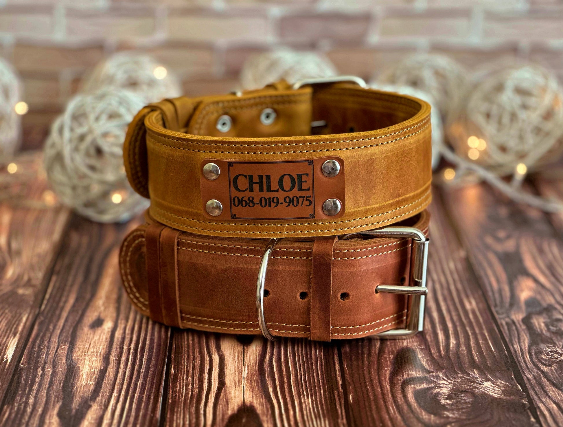Wide 2-inch sturdy leather dog collar with custom engraving, providing both comfort and reliability for large dogs.
