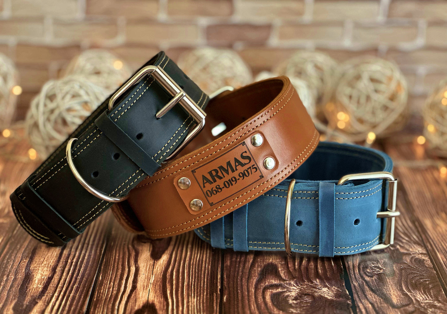 Wide 2-inch sturdy engraved leather dog collar with strong hardware, perfect for large dogs and training purposes.