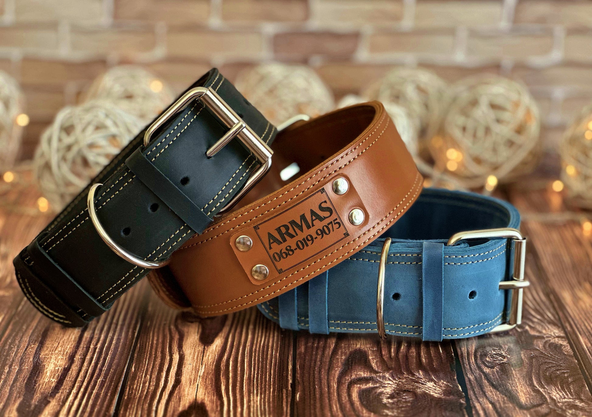 Wide 2-inch sturdy engraved leather dog collar with strong hardware, perfect for large dogs and training purposes.